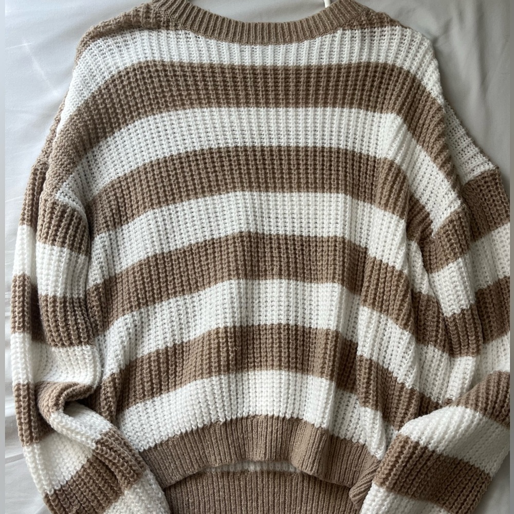Light brown and white knitted sweater